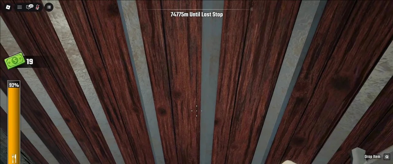 Holding the red barn wall with hay bales and iron sword drawn as zombies gather in Last Stop Roblox